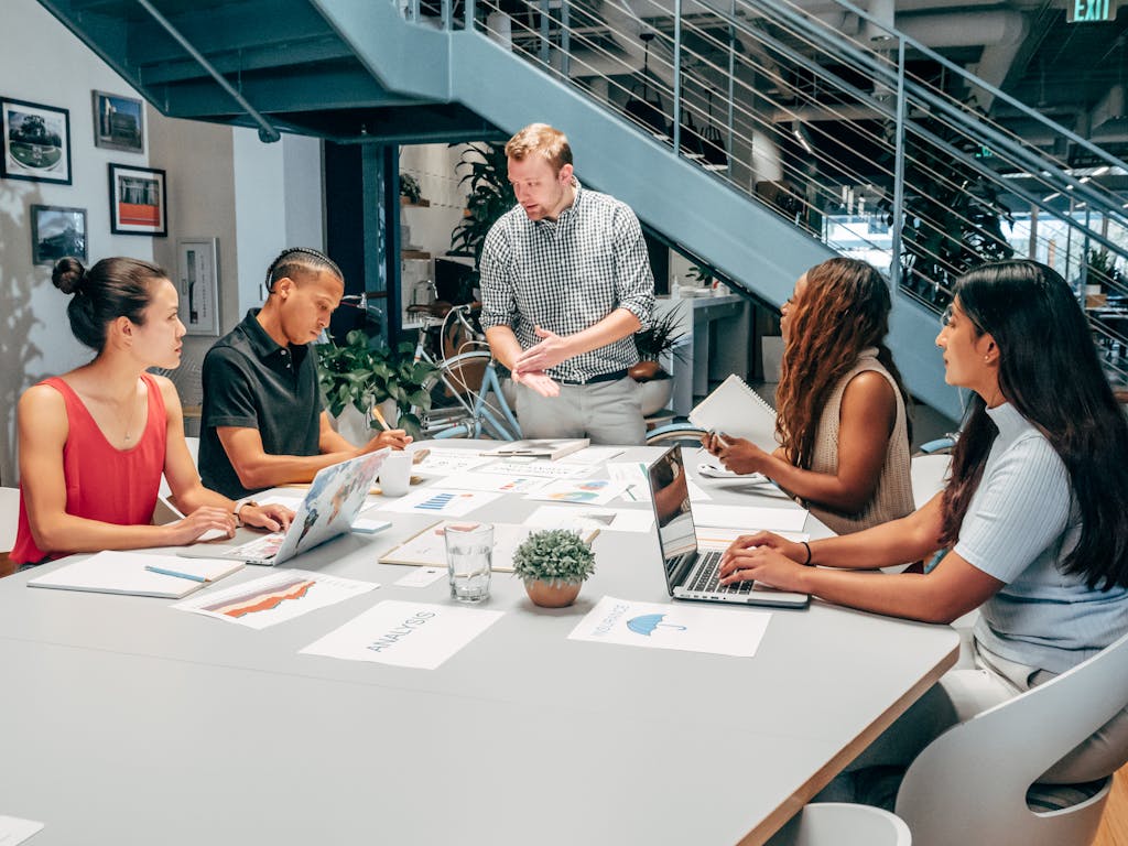 People Having a Meeting in an Office